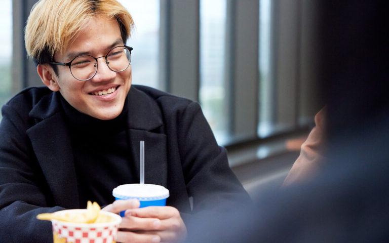 Photo of a student in cafeteria